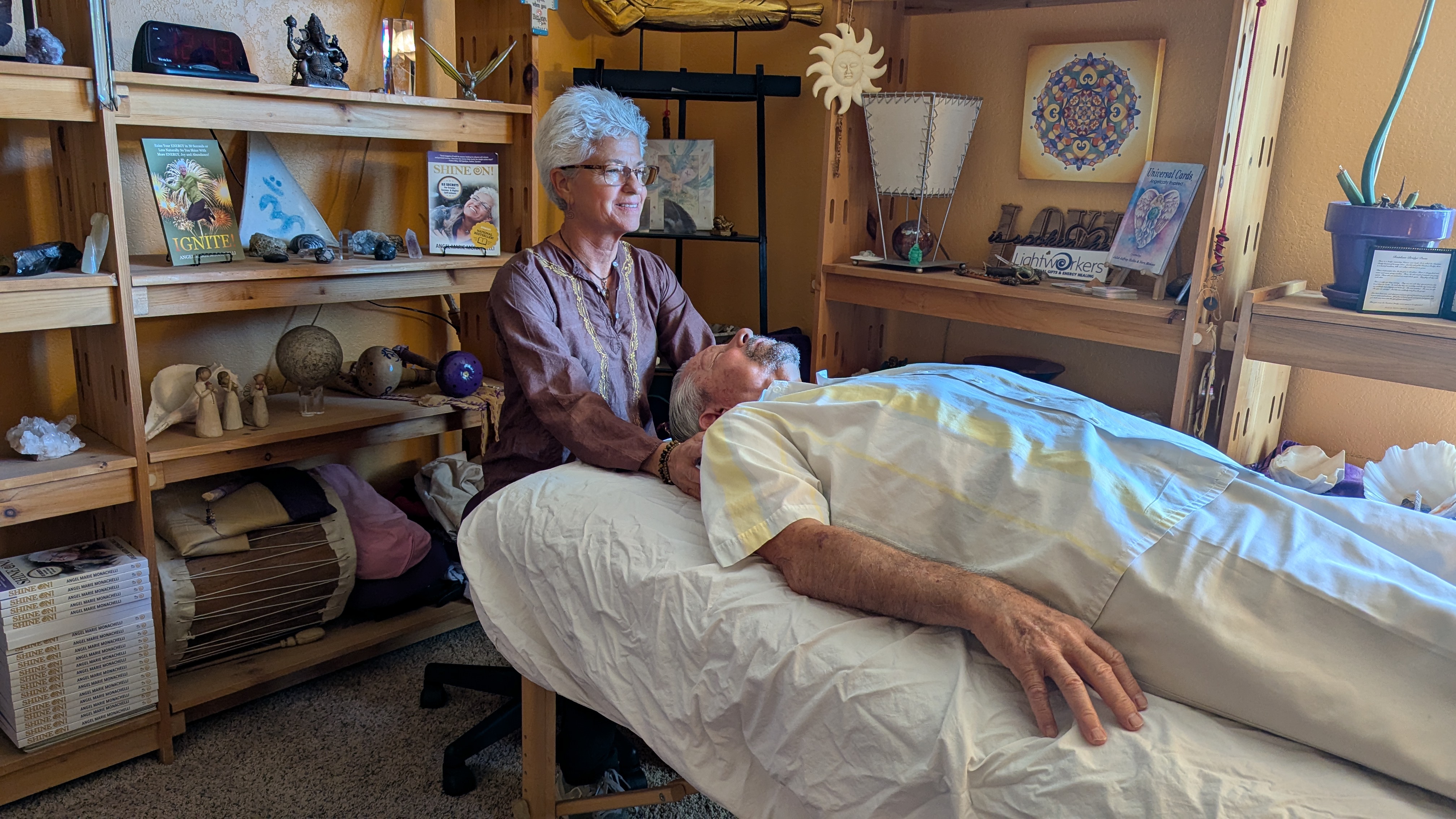 Angel Marie conducting Reiki energy healing session