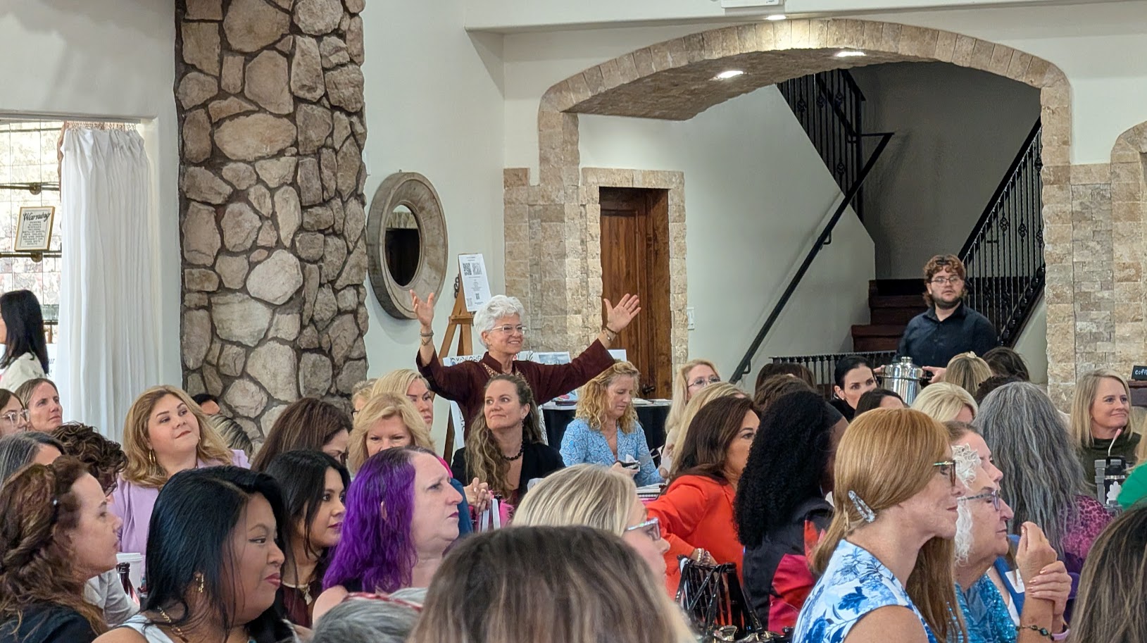 Angel Marie conducting live event energy